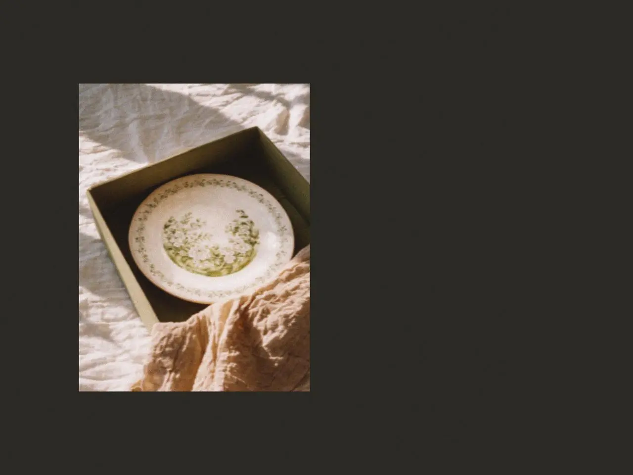 Lily of the valley ceramic mug and saucer with tea and desserts arranged on a linen table, a charming mug gift set and thoughtful lily of the valley gifts for spring gatherings.