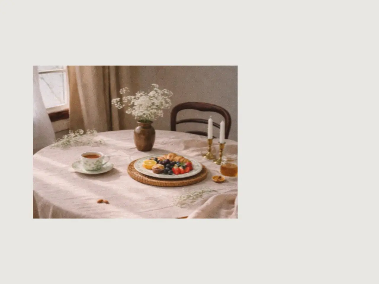 Round dining table styled with easter plates, ceramic coffee mugs, fresh flowers, and candles, creating soft easter table decorations for a sweet easter gathering with lily of the valley gifts inspiration.