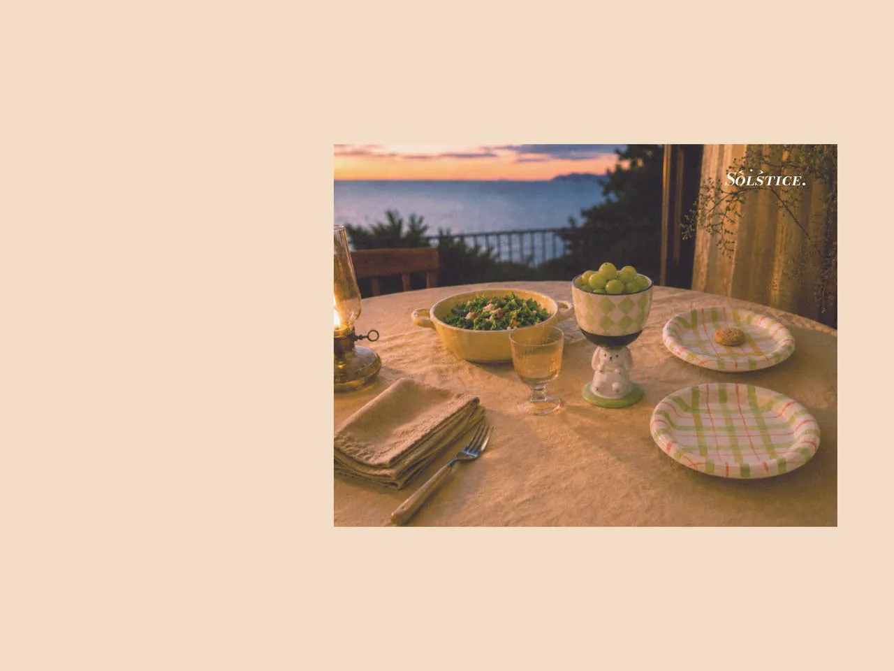 Evening table by the sea with ice cream cups, salad plates, picnic dinnerware, and a large salad bowl, styled with designer tableware for a calm and relaxed shared meal in warm sunset light.